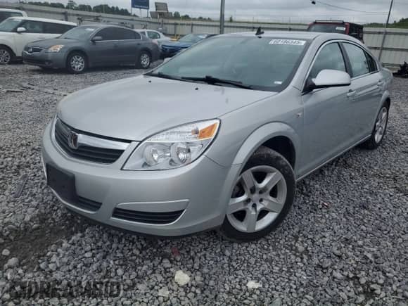 2009 Saturn Aura XE with VIN 1G8ZS57B69F242141, listed as a Copart auction lot 60186345 with 73,840 mi miles and Salvage title. Bid and sale history available at DreamBid. Image 1.