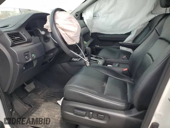 2018 Honda Pilot EX-L with VIN 5FNYF6H75JB060588, listed as a Copart auction lot 57268385 with 67,373 mi miles and Salvage title. Bid and sale history available at DreamBid. Image 7.