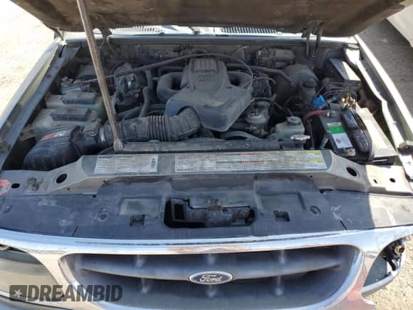 1999 Ford Explorer XLT z VIN 1FMZU34E6XZC13975, wystawiony jako Copart lot #52385945 z przebiegiem 189 932 mil mil oraz Szkoda całkowita • Salvage title. Historia ofert i sprzedaży dostępna na DreamBid. Obrazek 13.