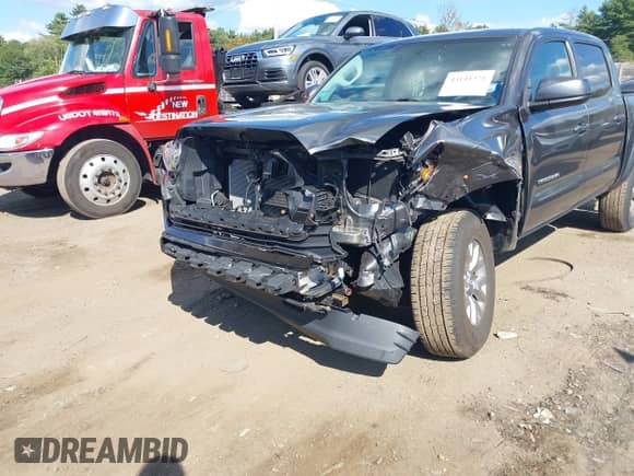 2017 Toyota Tacoma SR5 with VIN 3TMCZ5AN0HM102398, listed as a IAAI auction lot 43141321 with 136,440 mi miles and . Bid and sale history available at DreamBid. Image 6.