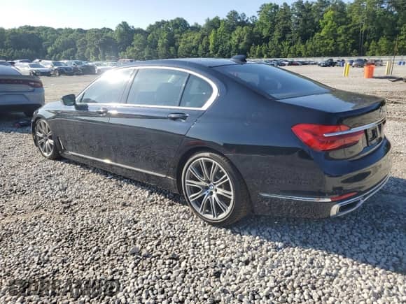 2018 BMW 7 Series 750i с VIN WBA7F0C52JGM24063, выставлен на аукционе Copart как лот 61251915 с пробегом 89 955 миль миль и Чистый • Clean title. История ставок и продаж доступна на DreamBid. Изображение 2.