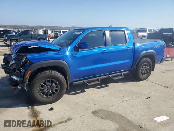 2024 Nissan Frontier Pro-X with VIN 1N6ED1EJ2RN646428, listed as a Copart auction lot 44304215 with 5,853 mi miles and Salvage title. Bid and sale history available at DreamBid. Image 1.