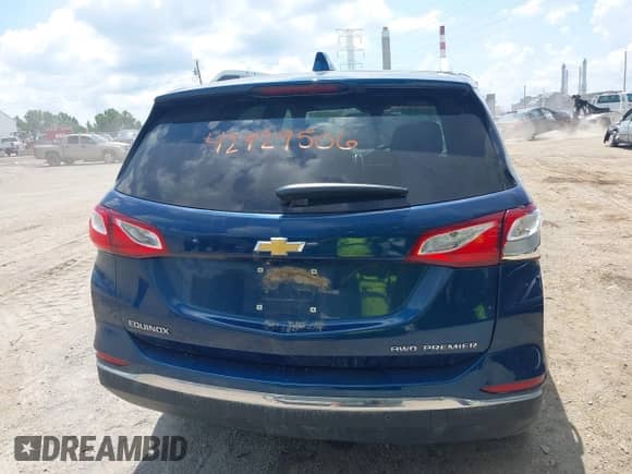 2021 Chevrolet Equinox Premier z VIN 2GNAXXEV4M6148508, wystawiony jako IAAI lot #42929506 z przebiegiem 59 861 mil mil oraz . Historia ofert i sprzedaży dostępna na DreamBid. Obrazek 16.
