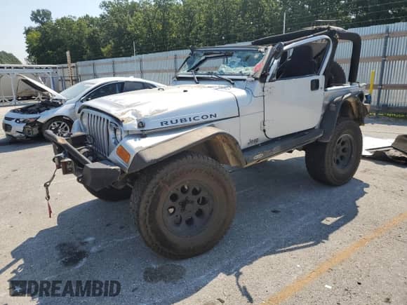 2004 Jeep Wrangler Rubicon z VIN 1J4FA69S14P718369, wystawiony jako Copart lot #67240595 z przebiegiem 135 975 mil mil oraz Szkoda całkowita • Salvage title. Historia ofert i sprzedaży dostępna na DreamBid. Obrazek 1.