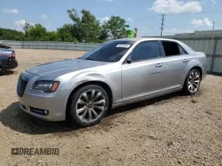 2014 Chrysler 300 S с VIN 2C3CCABGXEH377561, выставлен на аукционе Copart как лот 68300495 с пробегом 89 846 миль миль и Списание • Salvage title. История ставок и продаж доступна на DreamBid. Изображение 1.
