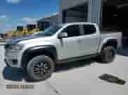 2018 Chevrolet Colorado 4WD Z71 with VIN 1GCGTDENXJ1267952, listed as a Copart auction lot 69554135 with 102,314 mi miles and Salvage title. Bid and sale history available at DreamBid. Image 1.