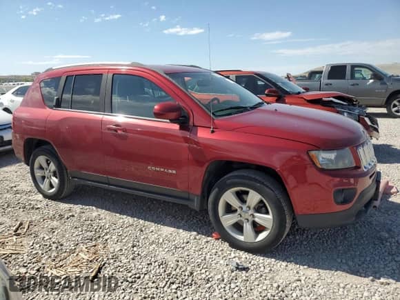 2015 Jeep Compass Latitude with VIN 1C4NJCEB5FD397611, listed as a Copart auction lot 57149015 with 130,292 mi miles and Salvage title. Bid and sale history available at DreamBid. Image 4.