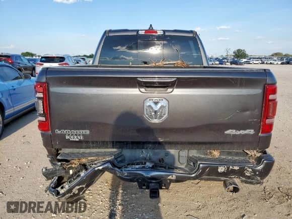 2023 Ram 1500 Laramie z VIN 1C6SRFJT4PN578424, wystawiony jako Copart lot #64832785 z przebiegiem Nie podano mil oraz Szkoda całkowita • Salvage title. Historia ofert i sprzedaży dostępna na DreamBid. Obrazek 6.