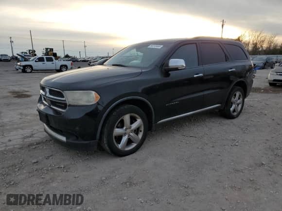2012 Dodge Durango Citadel with VIN 1C4RDHEG4CC257195, listed as a Copart auction lot 84212444 with 302,456 mi miles and Clean title. Bid and sale history available at DreamBid. Image 1.