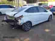 2017 Hyundai Accent SE z VIN KMHCT4AE2HU284284, wystawiony jako IAAI lot #42102719 z przebiegiem 128 000 mil mil oraz . Historia ofert i sprzedaży dostępna na DreamBid. Obrazek 4.