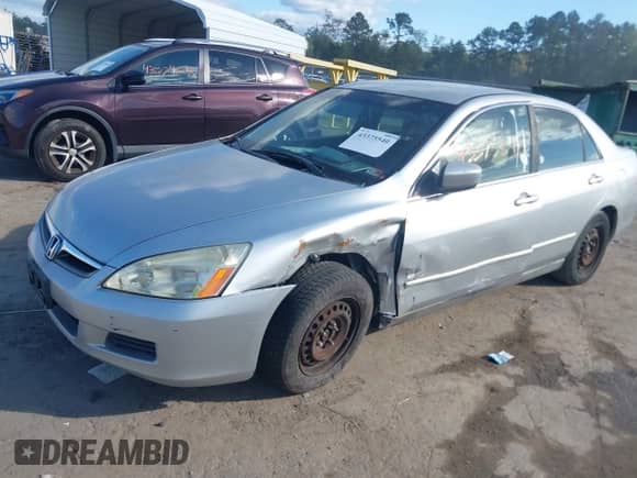 2006 Honda Accord LX with VIN 1HGCM56486A146773, listed as a IAAI auction lot 43375540 with 261,665 mi miles and . Bid and sale history available at DreamBid. Image 2.