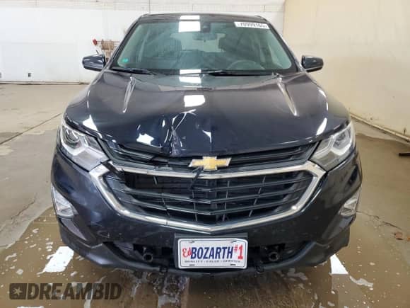 2021 Chevrolet Equinox LT with VIN 2GNAXUEV2M6105526, listed as a Copart auction lot 70999165 with 69,338 mi miles and Salvage title. Bid and sale history available at DreamBid. Image 5.
