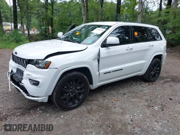 2021 Jeep Grand Cherokee Laredo E with VIN 1C4RJEAG3MC550990, listed as a IAAI auction lot 43031989 with 54,774 mi miles and . Bid and sale history available at DreamBid. Image 2.