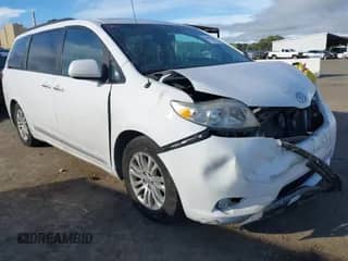 2013 Toyota Sienna XLE AAS with VIN 5TDYK3DC8DS324853, listed as a IAAI auction lot 41647704 with 143,656 mi miles and . Bid and sale history available at DreamBid. Image 1.