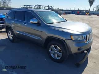 2012 Jeep Grand Cherokee Limited z VIN 1C4RJEBG1CC305182, wystawiony jako IAAI lot #43527445 z przebiegiem 164 219 mil mil oraz . Historia ofert i sprzedaży dostępna na DreamBid. Obrazek 1.