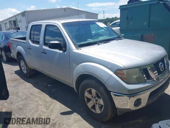 2009 Nissan Frontier SE with VIN 1N6AD07U59C407404, listed as a IAAI auction lot 42772182 with 183,640 mi miles and . Bid and sale history available at DreamBid. Image 1.