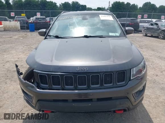 2018 Jeep Compass Trailhawk z VIN 3C4NJDDBXJT198919, wystawiony jako IAAI lot #42685470 z przebiegiem 139 764 mil mil oraz . Historia ofert i sprzedaży dostępna na DreamBid. Obrazek 13.