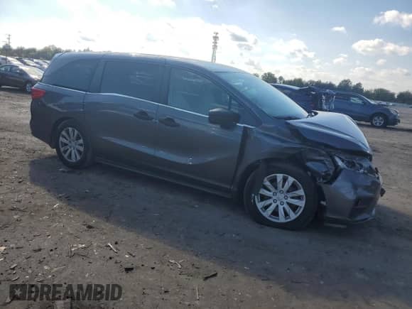 2018 Honda Odyssey LX with VIN 5FNRL6H21JB053039, listed as a Copart auction lot 81042375 with 154,474 mi miles and Salvage title. Bid and sale history available at DreamBid. Image 4.