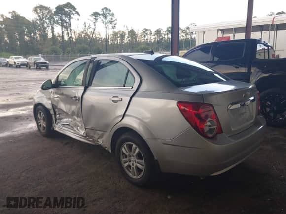 2015 Chevrolet Sonic LT with VIN 1G1JC5SG4F4163618, listed as a IAAI auction lot 43010786 with 73,208 mi miles and . Bid and sale history available at DreamBid. Image 3.