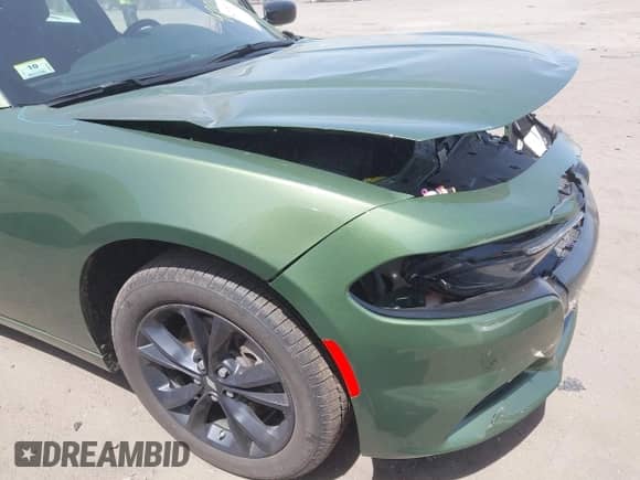 2023 Dodge Charger SXT with VIN 2C3CDXJGXPH675970, listed as a IAAI auction lot 42074717 with 5,930 mi miles and . Bid and sale history available at DreamBid. Image 18.