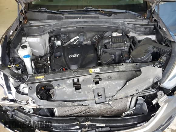 2015 Hyundai Santa Fe с VIN 5XYZT3LB2FG270489, выставлен на аукционе Copart как лот 81006145 с пробегом 70 904 миль миль и Списание • Salvage title. История ставок и продаж доступна на DreamBid. Изображение 12.