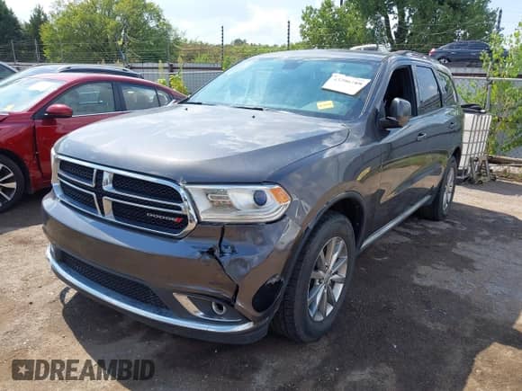 2016 Dodge Durango SXT with VIN 1C4RDJAG5GC393418, listed as a IAAI auction lot 43206789 with 153,703 mi miles and . Bid and sale history available at DreamBid. Image 2.