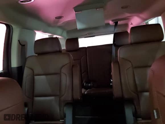 2018 Chevrolet Suburban Premier with VIN 1GNSKJKC2JR180229, listed as a Copart auction lot 84001115 with 144,207 mi miles and Clean title. Bid and sale history available at DreamBid. Image 10.