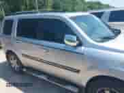 2010 Honda Pilot Touring with VIN 5FNYF3H94AB022723, listed as a IAAI auction lot 42378211 with 326,338 mi miles and . Bid and sale history available at DreamBid. Image 14.