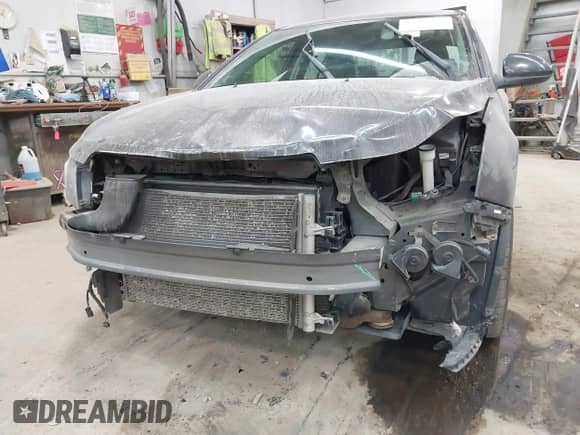 2015 Chevrolet Cruze LT with VIN 1G1PE5SB4F7112577, listed as a IAAI auction lot 43212360 with 210,905 mi miles and . Bid and sale history available at DreamBid. Image 6.