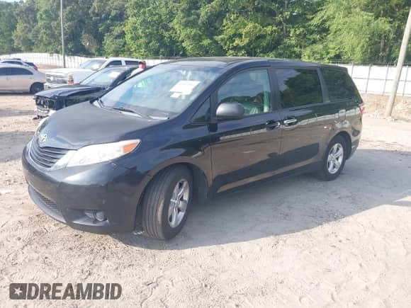 2015 Toyota Sienna L with VIN 5TDZK3DC3FS598131, listed as a IAAI auction lot 42612342 with 201,864 mi miles and . Bid and sale history available at DreamBid. Image 2.