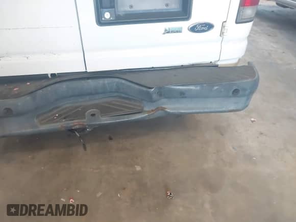 2010 Ford Econoline Cargo Commercial with VIN 1FTNE2EL7ADA74595, listed as a IAAI auction lot 42512878 with 154,412 mi miles and . Bid and sale history available at DreamBid. Image 6.