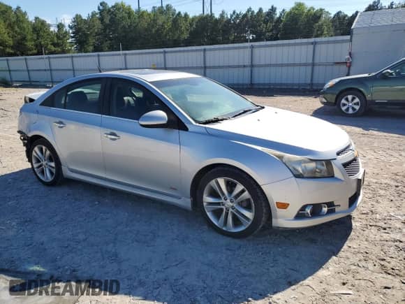 2012 Chevrolet Cruze LTZ with VIN 1G1PH5SC1C7126478, listed as a Copart auction lot 69722315 with 105,318 mi miles and Salvage title. Bid and sale history available at DreamBid. Image 4.