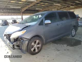 2012 Toyota Sienna with VIN 5TDKA3DC5CS009547, listed as a Copart auction lot 70213395 with 197,642 mi miles and Salvage title. Bid and sale history available at DreamBid. Image 1.