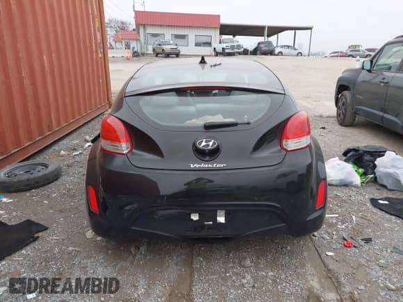2014 Hyundai Veloster with VIN KMHTC6AD6EU182596, listed as a IAAI auction lot 41498382 with 99,376 mi miles and . Bid and sale history available at DreamBid. Image 16.