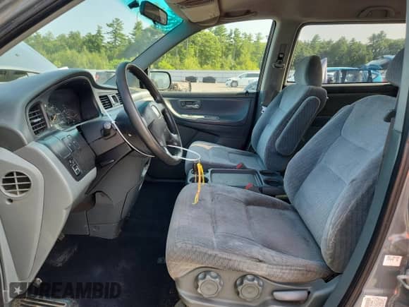 2002 Honda Odyssey LX with VIN 2HKRL18532H504584, listed as a Copart auction lot 67735975 with 230,708 mi miles and Salvage title. Bid and sale history available at DreamBid. Image 7.