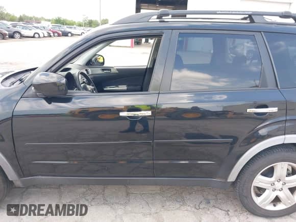 2009 Subaru Forester X with VIN JF2SH63659H756959, listed as a IAAI auction lot 42857776 with 214,307 mi miles and . Bid and sale history available at DreamBid. Image 15.