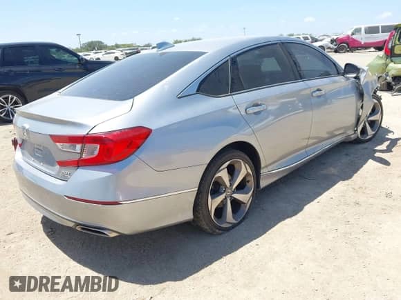 2018 Honda Accord Touring z VIN 1HGCV2F92JA008629, wystawiony jako IAAI lot #43109615 z przebiegiem 82 861 mil mil oraz . Historia ofert i sprzedaży dostępna na DreamBid. Obrazek 4.