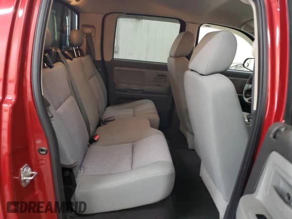 2009 Dodge Dakota Bighorn/Lonestar z VIN 1D7HW38P19S778173, wystawiony jako Copart lot #51582035 z przebiegiem 43 544 mil mil oraz Szkoda całkowita • Salvage title. Historia ofert i sprzedaży dostępna na DreamBid. Obrazek 10.