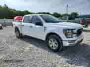 2023 Ford F-150 Lariat with VIN 1FTFW1E89PFA91516, listed as a Copart auction lot 61666315 with 65,711 mi miles and Salvage title. Bid and sale history available at DreamBid. Image 4.