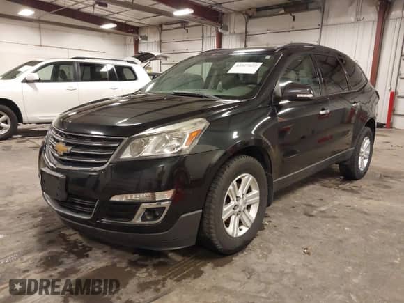 2014 Chevrolet Traverse LT with VIN 1GNKVHKD9EJ365732, listed as a IAAI auction lot 42327622 with 163,456 mi miles and . Bid and sale history available at DreamBid. Image 21.