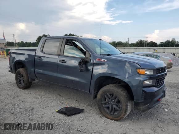 2021 Chevrolet Silverado 1500 Custom Trail Boss with VIN 1GCPYCEF0MZ283586, listed as a Copart auction lot 69621155 with 97,773 mi miles and Salvage title. Bid and sale history available at DreamBid. Image 4.