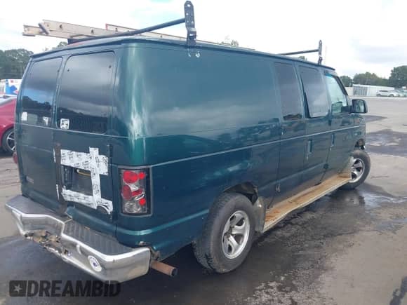 2000 Ford Econoline Cargo with VIN 1FTRE14W8YHB06853, listed as a IAAI auction lot 43410530 with 215,864 mi miles and . Bid and sale history available at DreamBid. Image 4.