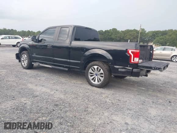 2017 Ford F-150 XL with VIN 1FTEX1CP5HKE14648, listed as a IAAI auction lot 42851598 with 209,985 mi miles and . Bid and sale history available at DreamBid. Image 3.