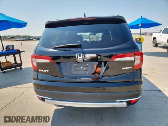 2021 Honda Pilot Touring 7-Passenger z VIN 5FNYF5H67MB014914, wystawiony jako Copart lot #68926445 z przebiegiem 41 983 mil mil oraz Szkoda całkowita • Salvage title. Historia ofert i sprzedaży dostępna na DreamBid. Obrazek 6.