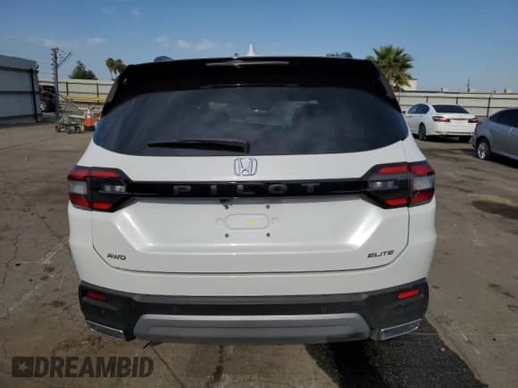 2025 Honda Pilot Elite with VIN 5FNYG1H81SB020096, listed as a Copart auction lot 70533595 with 12,951 mi miles and Salvage title. Bid and sale history available at DreamBid. Image 6.