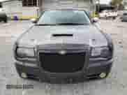 2006 Chrysler 300 C with VIN 2C3KA63H06H423471, listed as a Copart auction lot 80374895 with 180,078 mi miles and Salvage title. Bid and sale history available at DreamBid. Image 5.