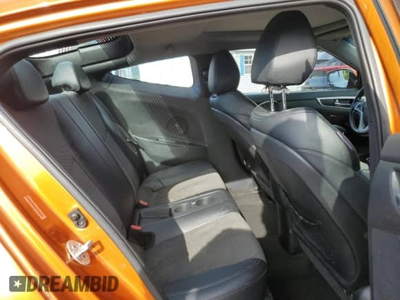 2013 Hyundai Veloster w/Black Int с VIN KMHTC6AD5DU178389, выставлен на аукционе Copart как лот 80652785 с пробегом 150 305 миль миль и Списание • Salvage title. История ставок и продаж доступна на DreamBid. Изображение 10.