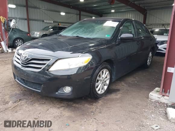 2011 Toyota Camry XLE with VIN 4T1BK3EKXBU128218, listed as a IAAI auction lot 43292489 with 119,819 mi miles and . Bid and sale history available at DreamBid. Image 2.