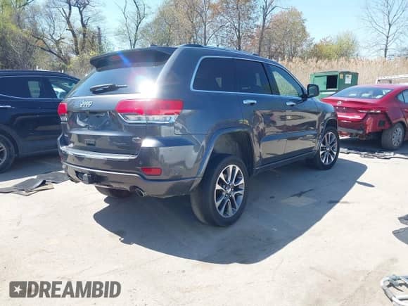 2017 Jeep Grand Cherokee Overland with VIN 1C4RJFCG0HC602990, listed as a IAAI auction lot 41998539 with 170,640 mi miles and . Bid and sale history available at DreamBid. Image 4.