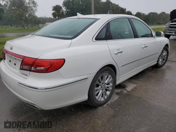 2011 Hyundai Azera Limited с VIN KMHFC4DF0BA544501, выставлен на аукционе Copart как лот 75701714 с пробегом Не указан миль и Списание • Salvage title. История ставок и продаж доступна на DreamBid. Изображение 3.